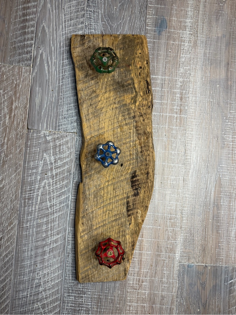 Rustic Reclaimed Wood Wall Hook with Red, Blue, and Green Valve Handles